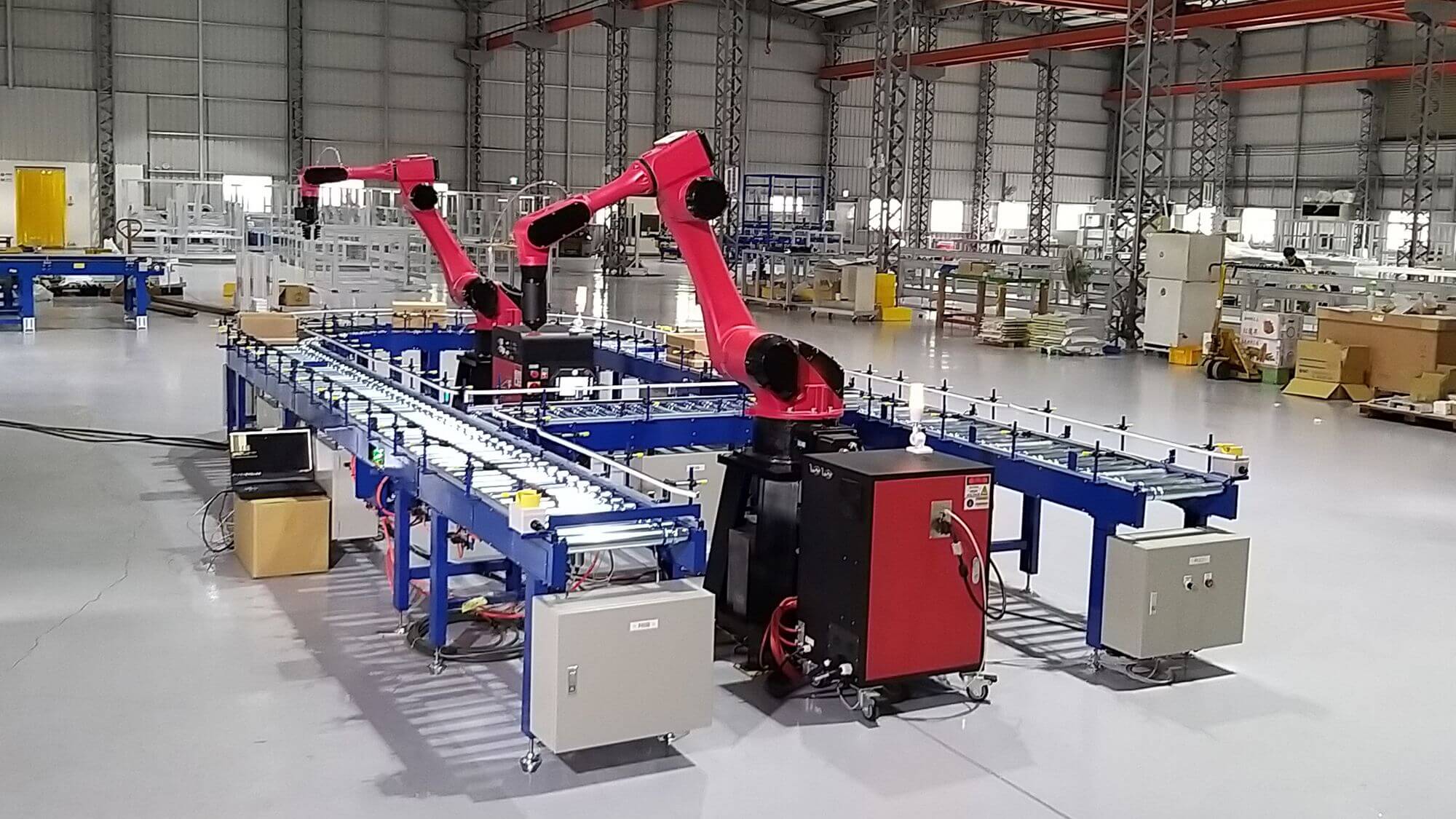 Material Box Filling System with Robotic Arm